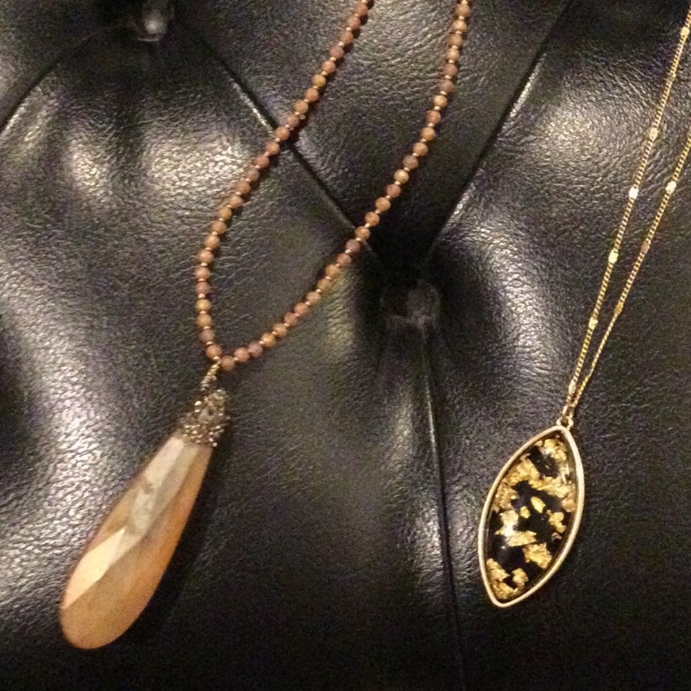 Pair of new with tags long necklaces with statement flare!